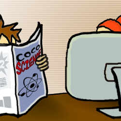 a person holding a magazine and another looking at a computer monitor